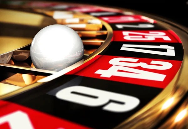 Baccarat table with dealer and cards
